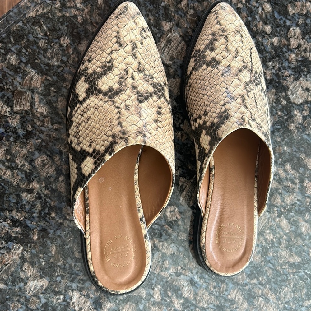 Beautiful snakeskin ATP mules.  Excellent, near new condition.  Made in Italy.